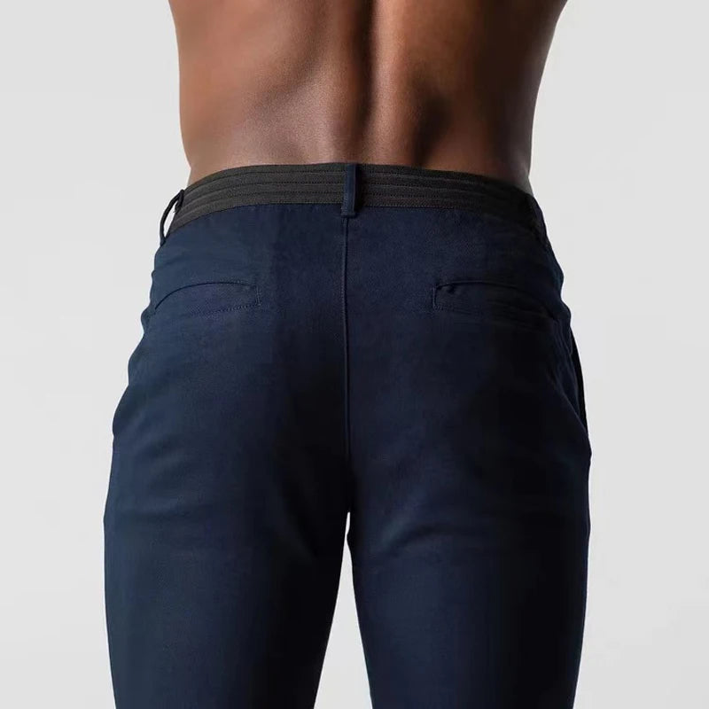 Spodnie z tapered slim, z kieszeniami, z guzikiem i wykończeniem na końcach